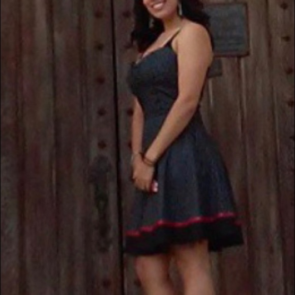 Pretty black pokadot dress with red trim accent